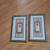 Two 24 by 14 inch pictures glass with gold/bronze color frame 1 thumbnail