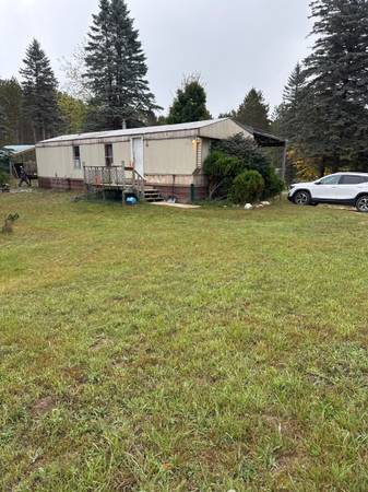 $1,150 / 2br - $1150 2 bedroom mobile home with carport (Rapid City/Kalkaska)64037894856579121
