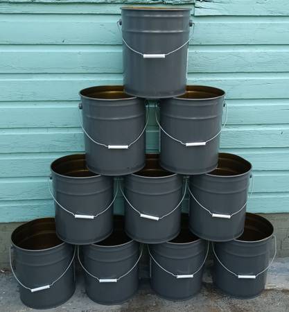 Ten (10) 5 gallon metal buckets no tops pretty clean 1