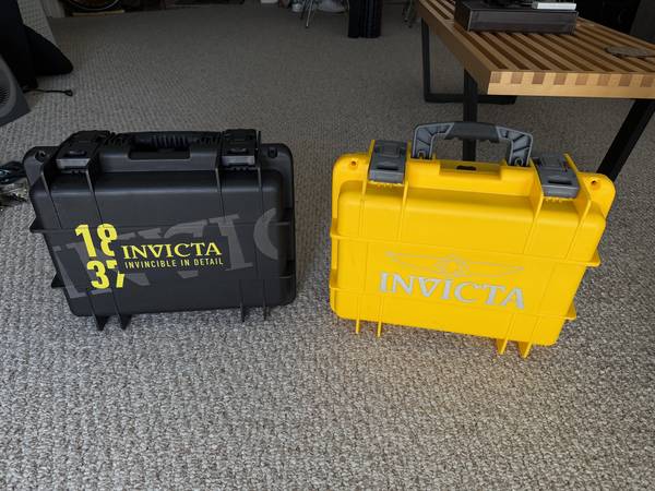 2 Invicta Dive Cases (about brief case size) similar to Pelican case. 1