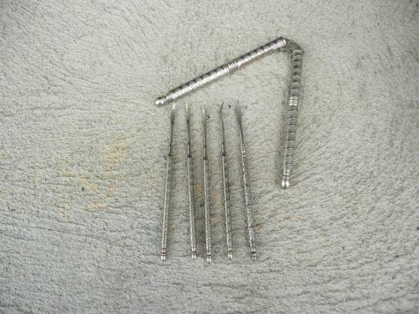 Silver Nut Cracker and 5 Picks 1