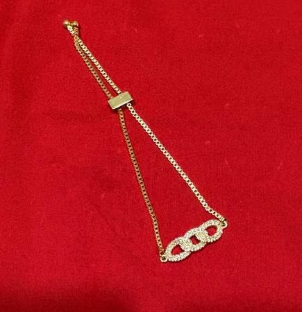 Gold toned bracelet with cubic zirconia 1