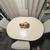 42” Round Dining Table w/ 4 Chairs + 18” Leaf Extension 1 thumbnail