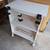 Nice multi use white table shelf unit on wheels or laptop desk 2 thumbnail