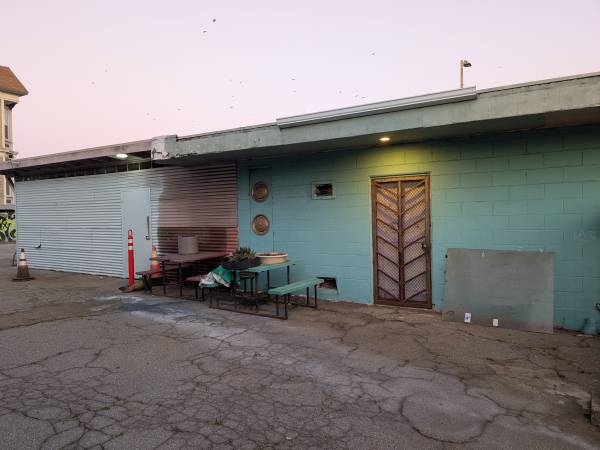 small warehouse and yard with bathroom and remote gate opener 1