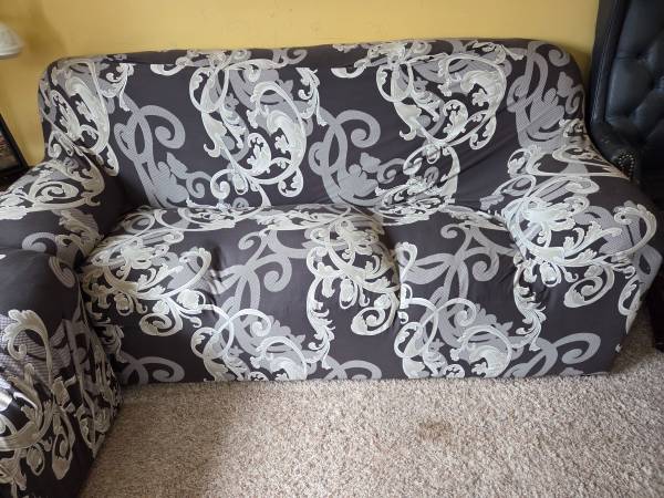 $75 for leather sofas, 2 sofa covers and storage/ display table 1