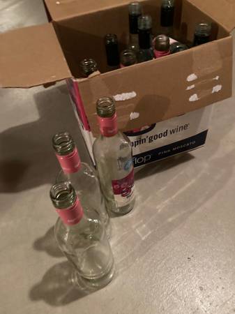 Case of empty glass wine bottles 1