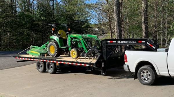 26' Deckover Gooseneck Tilt headed South 1