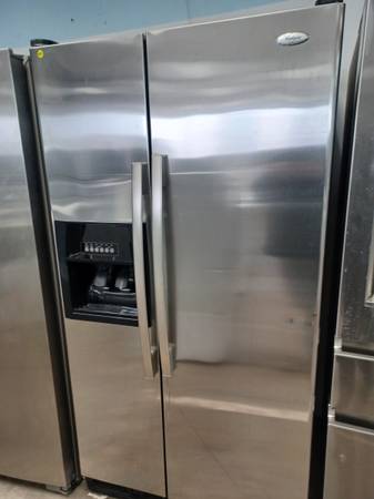 Whirlpool side by side refrigerator 1