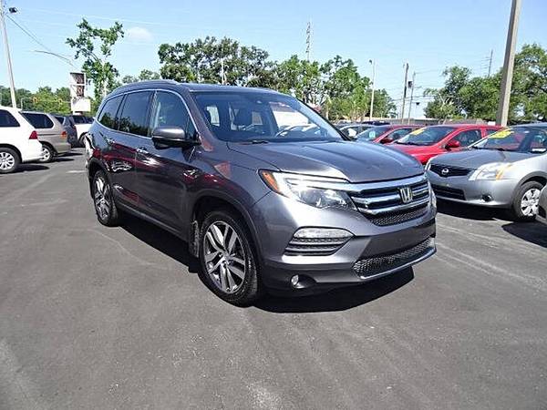 2016 Honda Pilot Touring 4 puertas SUV - $7900.0063443482644737121
