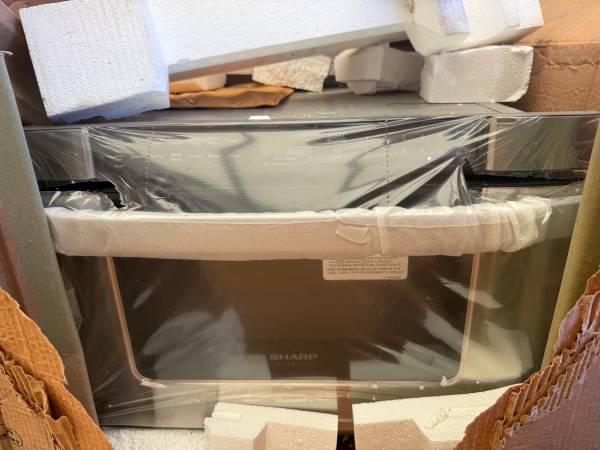 Sharp 24” microwave drawer stainless steel new conditions 1