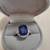 Sterling Silver Ring With Sapphire Color Stone Surrounded By CZs 1 thumbnail