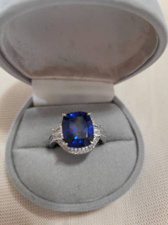 Sterling Silver Ring With Sapphire Color Stone Surrounded By CZs 1