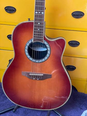 Ovation Celebrity acoustic guitar with hard case 1