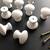 10 White Wooden Dresser Knobs. New condition. Roughly 1 1/2” W/ Screws 1 thumbnail