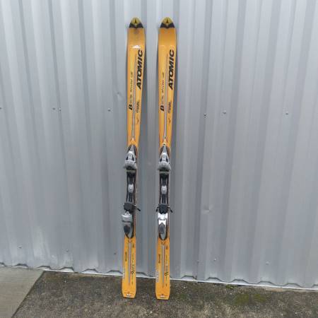 Atomic beta ride 9.22 skis orange 70" comes with poles 1