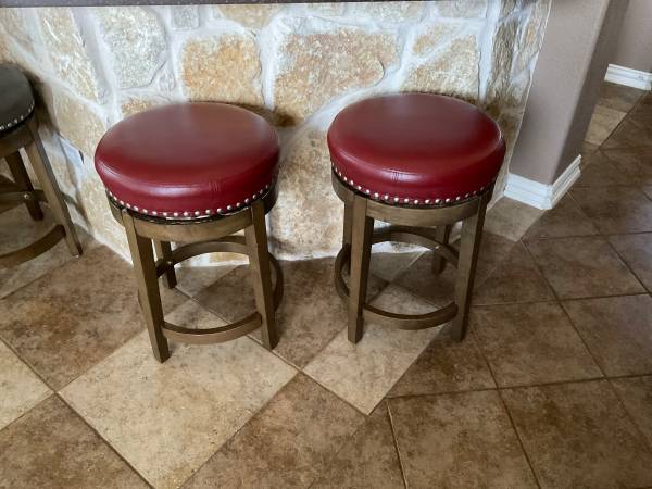2 Leather swivel barstools 1