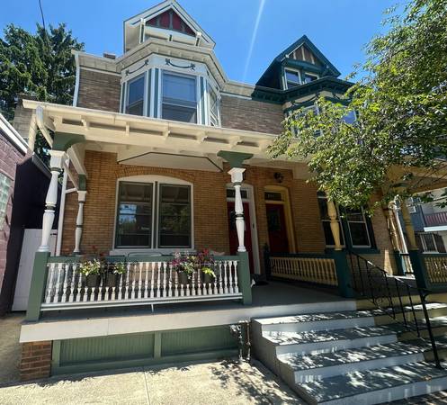 Light filled and spacious 2 bed , 1 bath historic home on one of the b 1