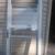 Used Larson roll up screen 32" white roll up screen storm door. 1 thumbnail