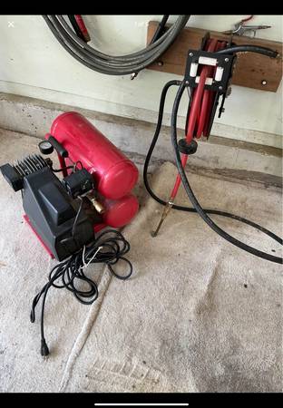 Twin tank air compressor with hoses, tools etc - $150 (Columbia)63441860231939120