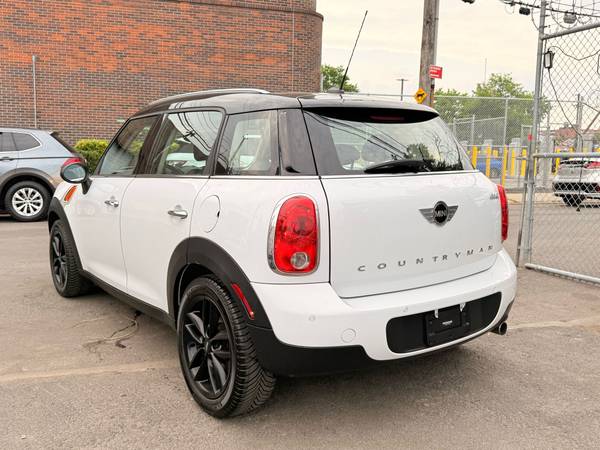 2014 MINI Cooper CountryMan 105k título limpio - $6,900 (Brooklyn)63654716802433124