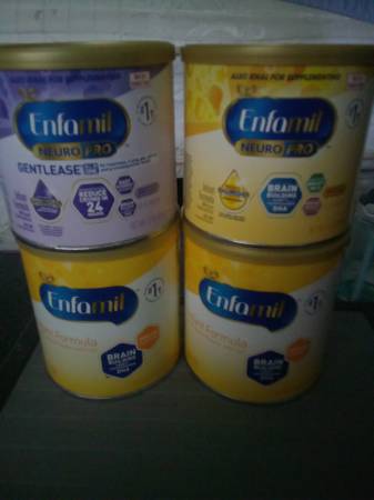 Four cans of enfamil formula 1
