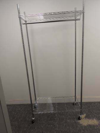 mobile clothes rack with a shelf & wheels 1