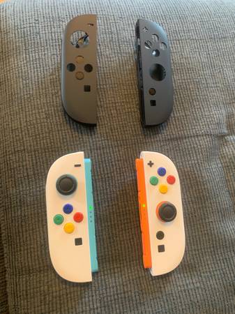 Nintendo switch 2 controllers with custom shell and colored buttons 1