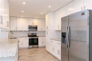 $6,000 / 3br - 2018ft2 - Renovated 3/2 home in the Village of Biscayne Park. O (BISCAYNE PARK)64049454936705124