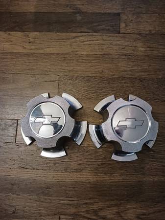 two Chevy center caps 1