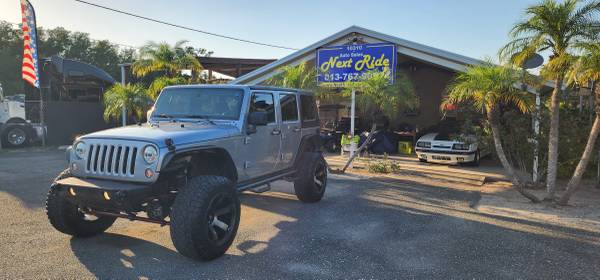 ★LIFTED WRANGLER 4WD★2016 JEEP UNLIMITED SAHARA 35'S NEW BRAKES CLEAN - $16,500 (TAMPA, FL)63443316059651121