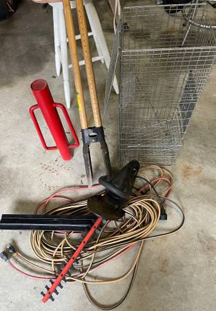 Electric hedge trimmer , cord , trap, post hole 1