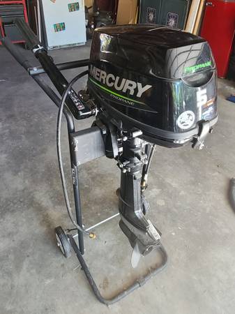 Zodiac & 5hp propane outboard 1