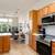 The spacious living room featuring new custom Bali Cellular Shades se 4 thumbnail