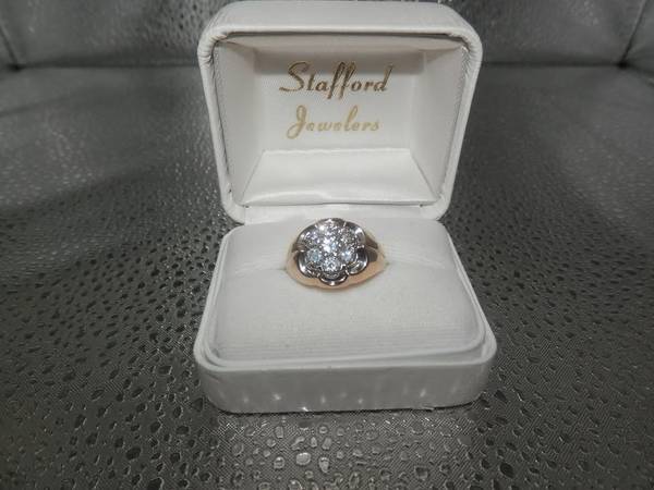 Solid 10K ring with .875 ctw of Diamonds,everything tested.Sz 9-9.25 1