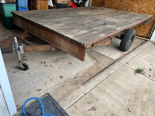 Flat bed tilt trailer 1