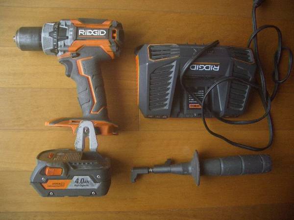 Ridgid HAMMER Drill 18V Brushless Impact Driver with 4A Battery 1