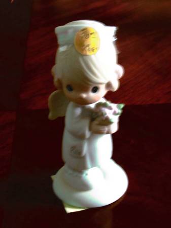 Three Precious Moments Figurines 1