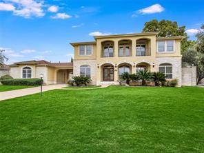 Mediterranean style lake view home with a large back yard pool and spa 1