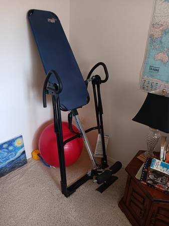 Teeter inversion table. 1