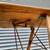 Rustic wooden ironing board with a distinctive slatted top design 15 thumbnail