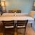 Heavy, well-made dining table with 4 chairs. 1 thumbnail