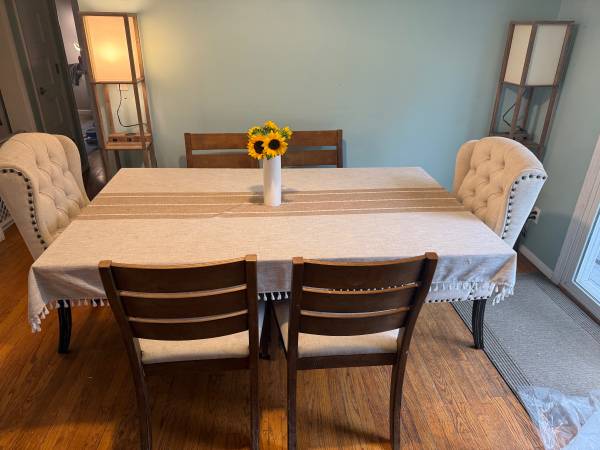 Heavy, well-made dining table with 4 chairs. 1