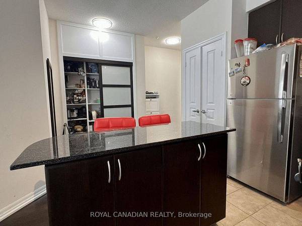 Bright and spacious 2 bedroom plus den suite with parking and locker 2