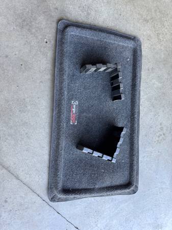 Floormat with velcro brackets to secure items in your cargo area/trunk 1