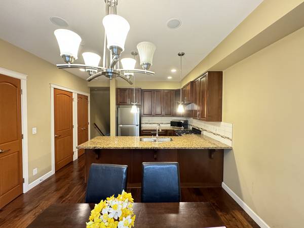 Immaculate 3bed and 3bath plus Den end unit Townhouse in Yorkson Creek 1