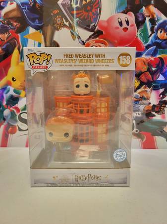 Harry Potter Fred Weasley with Weasleys' Wizard Funko Pop 1