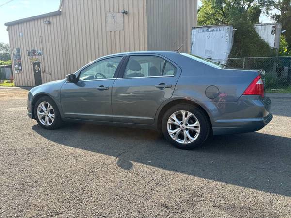 (EN OFERTA) Ford Fusion SE 2012, funciona excelente, color azul (Financiamos) - $4.500 (CARMEL NY / DANBURY LLAME AL 203 231 1817)63436938560257122