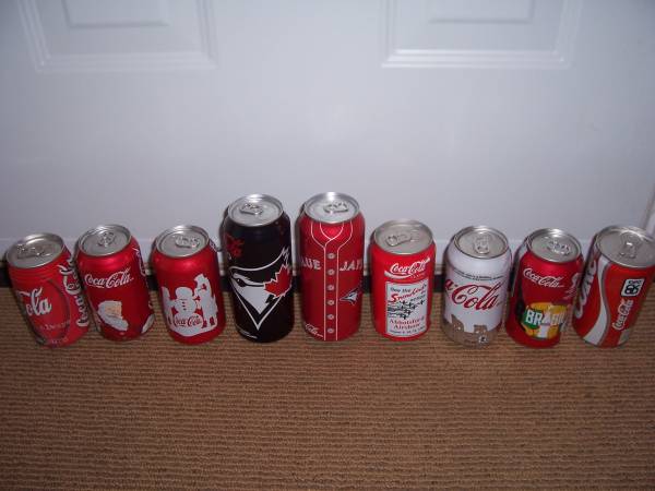 Unopened Coke Cans 1