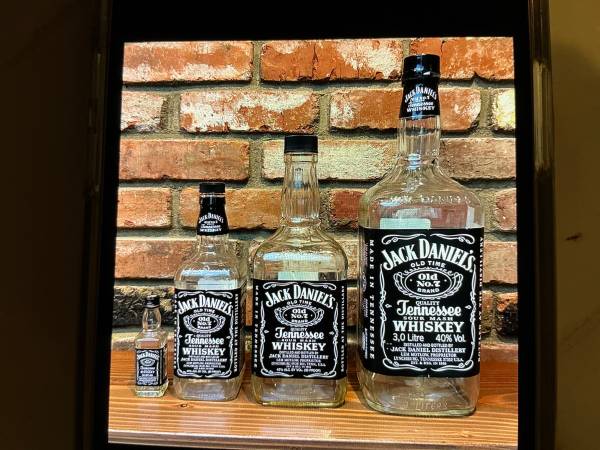 4 old style Jack Daniel’s bottles (empty) 1